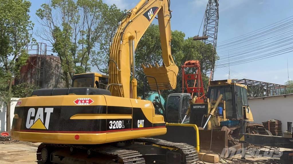 CAT 320 B L حفارات زحافة