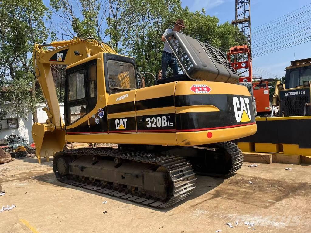 CAT 320 B L حفارات زحافة