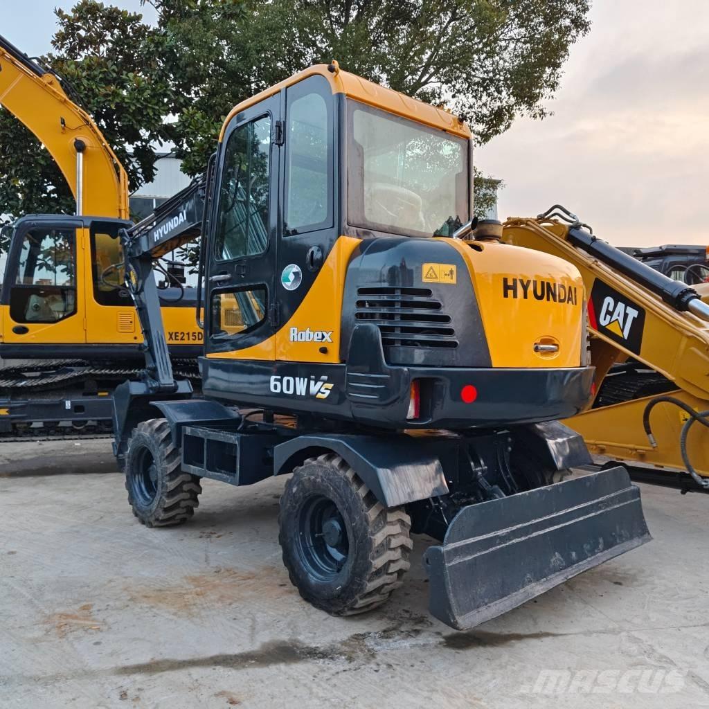 Hyundai Robex 60-7 حفارات بعجل