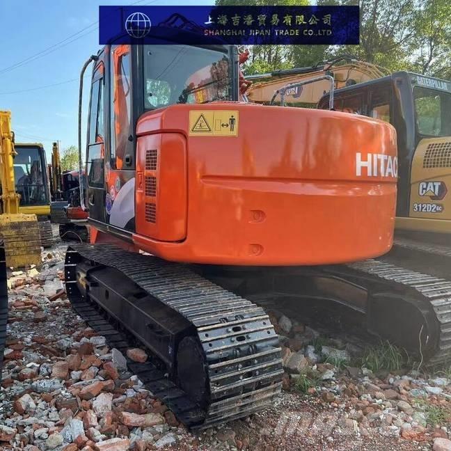 Hitachi ZX 135 حفارات زحافة