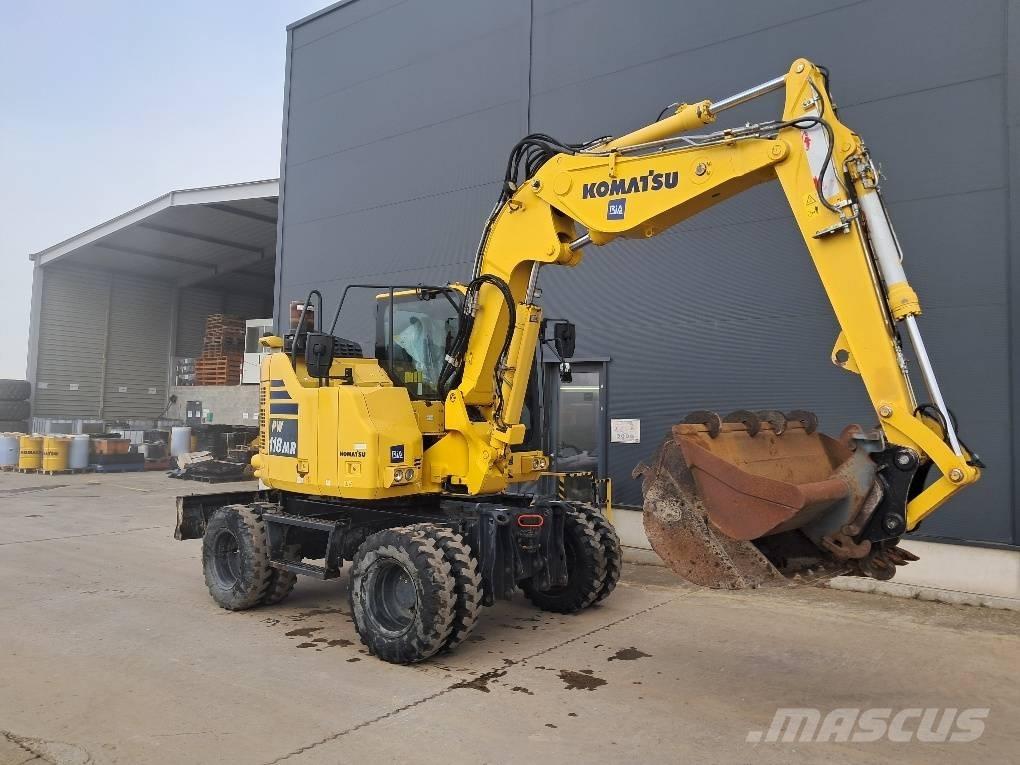 Komatsu PW118MR-11 حفارات بعجل