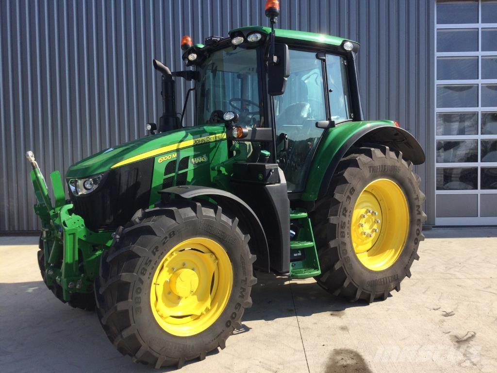 John Deere 6100M الجرارات