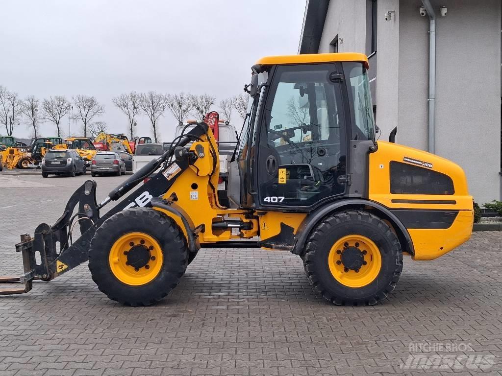 JCB 407 لوادر بعجل