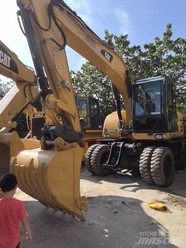 CAT 315 D حفارات بعجل