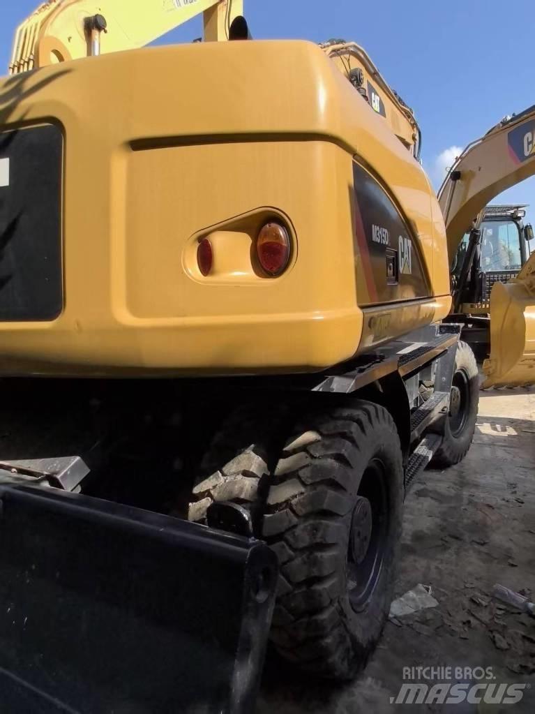 CAT 315 D حفارات بعجل
