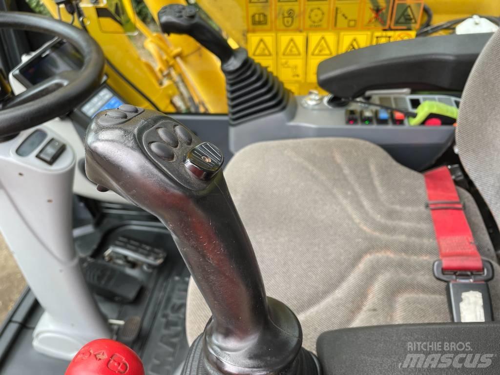 Komatsu PW 180-11 حفارات بعجل