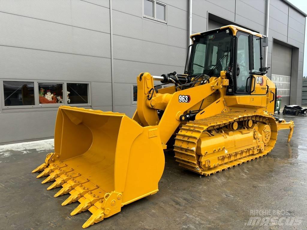 CAT 963 *MIETE/RENTAL لوادر زحافة