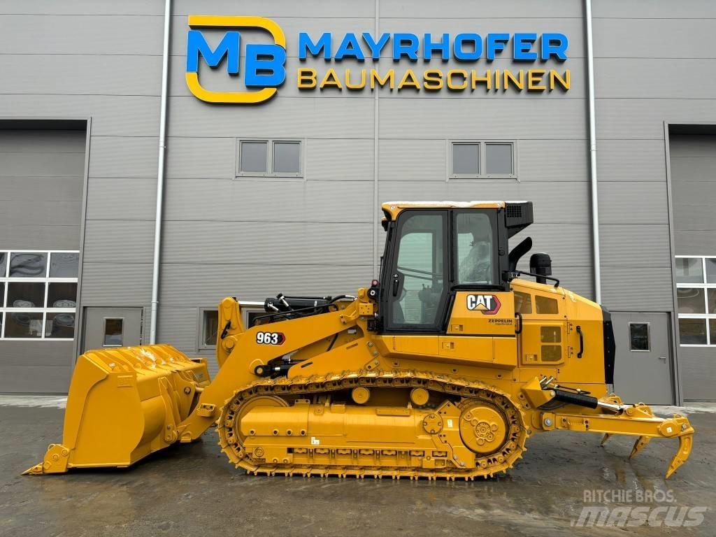 CAT 963 *MIETE/RENTAL لوادر زحافة