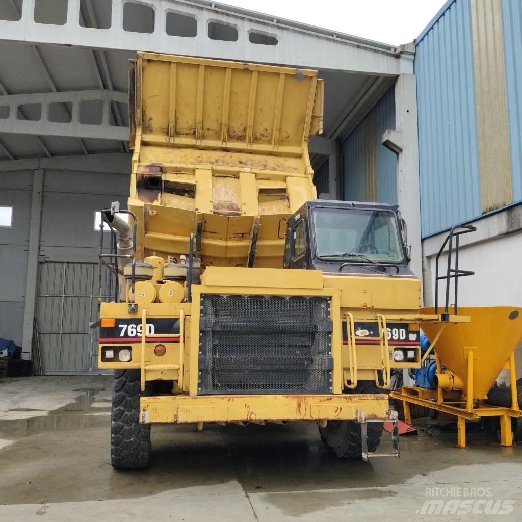 CAT 769 D شاحنات المخلفات الصلبة