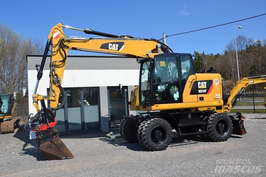 CAT M 315 F حفارات بعجل