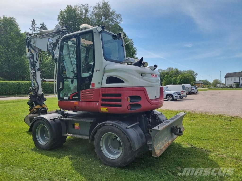 Take-Job TB 295W حفارات بعجل