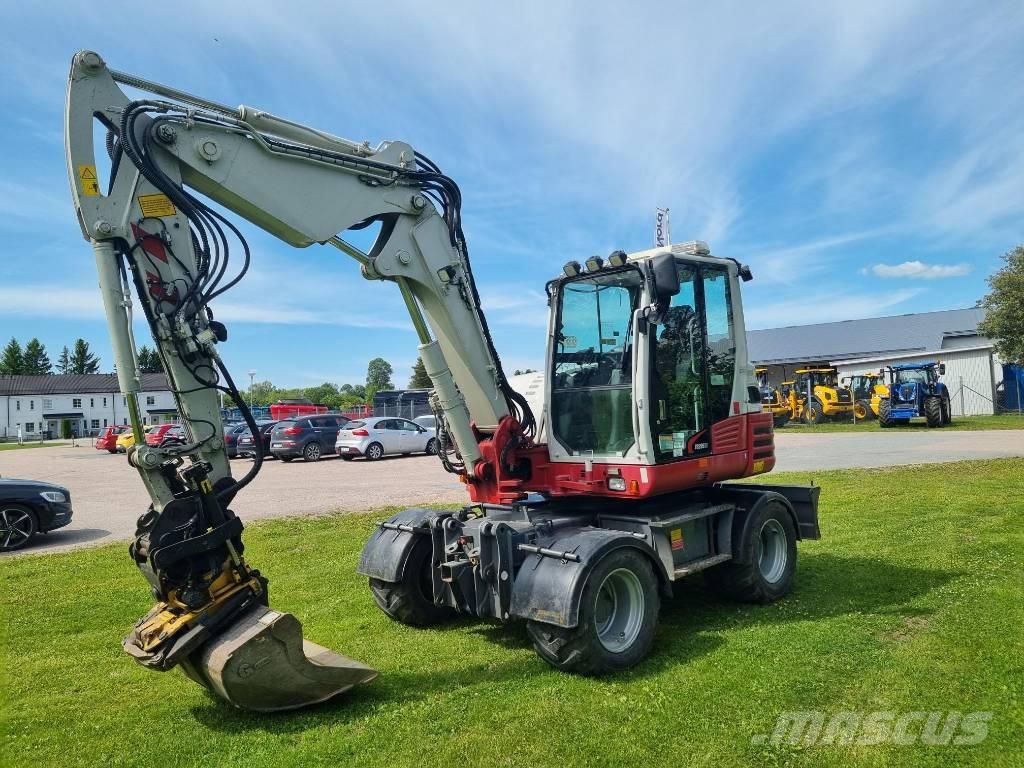 Take-Job TB 295W حفارات بعجل