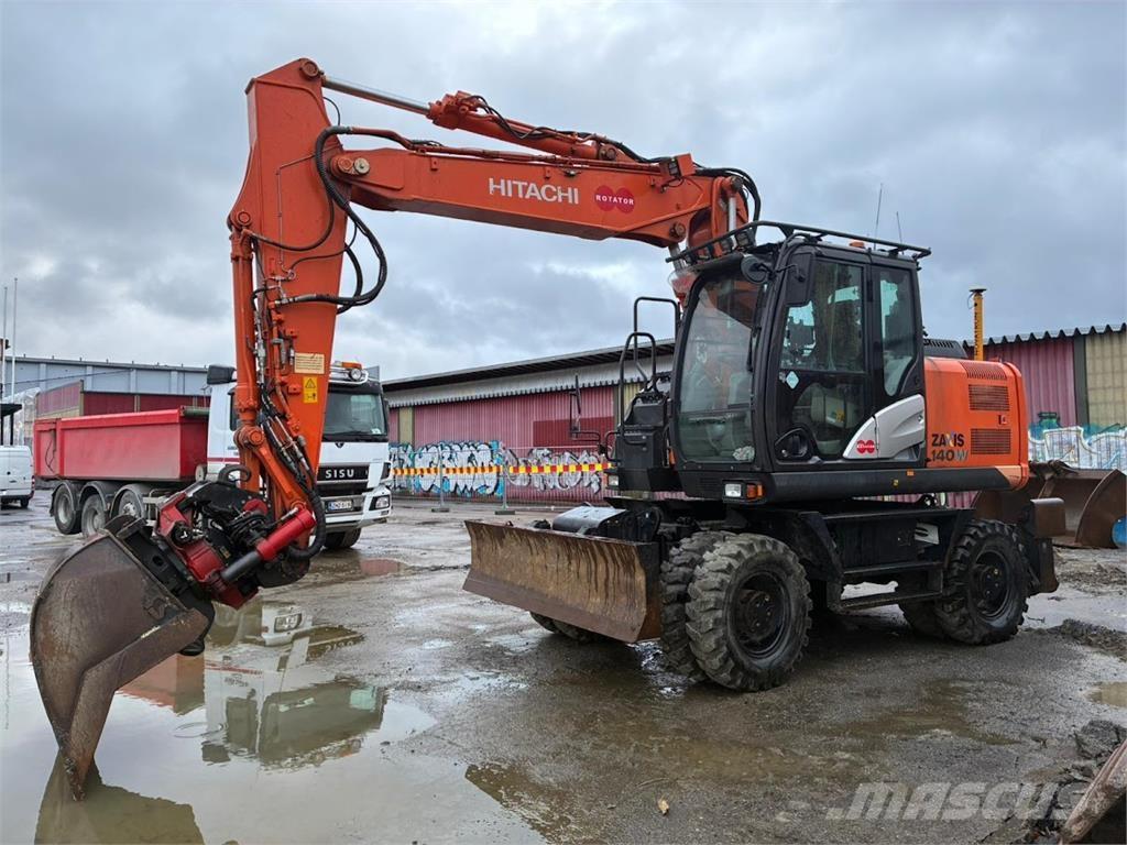 Hitachi ZX140W حفارات بعجل
