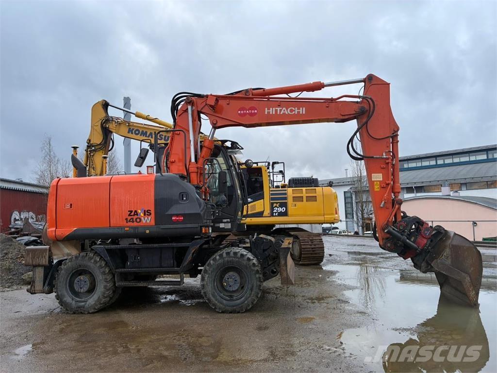 Hitachi ZX140W حفارات بعجل