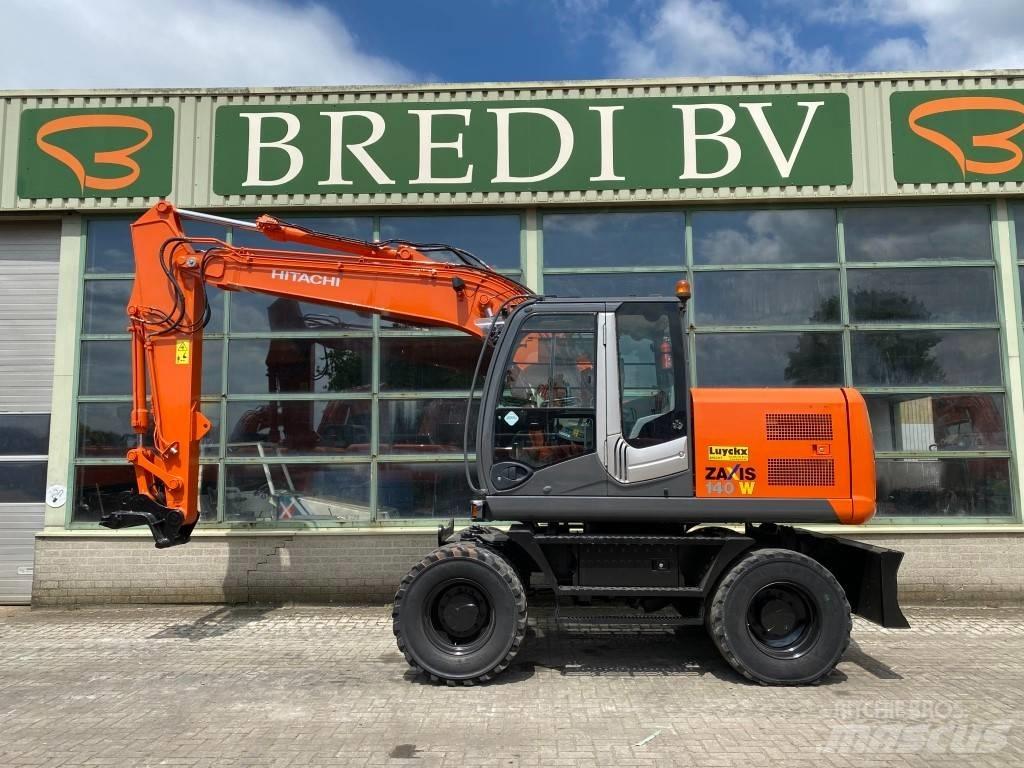 Hitachi Zaxis 140W-3 حفارات بعجل