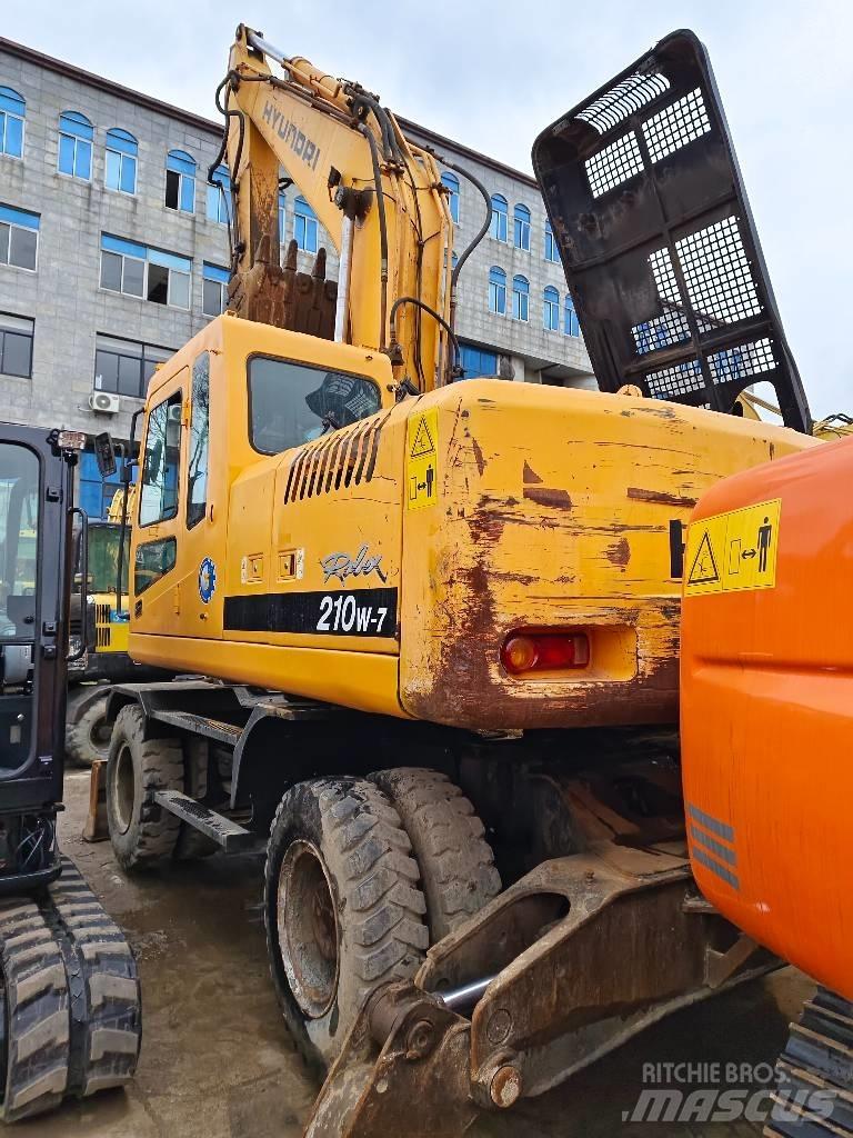 Hyundai R210W-7 حفارات بعجل