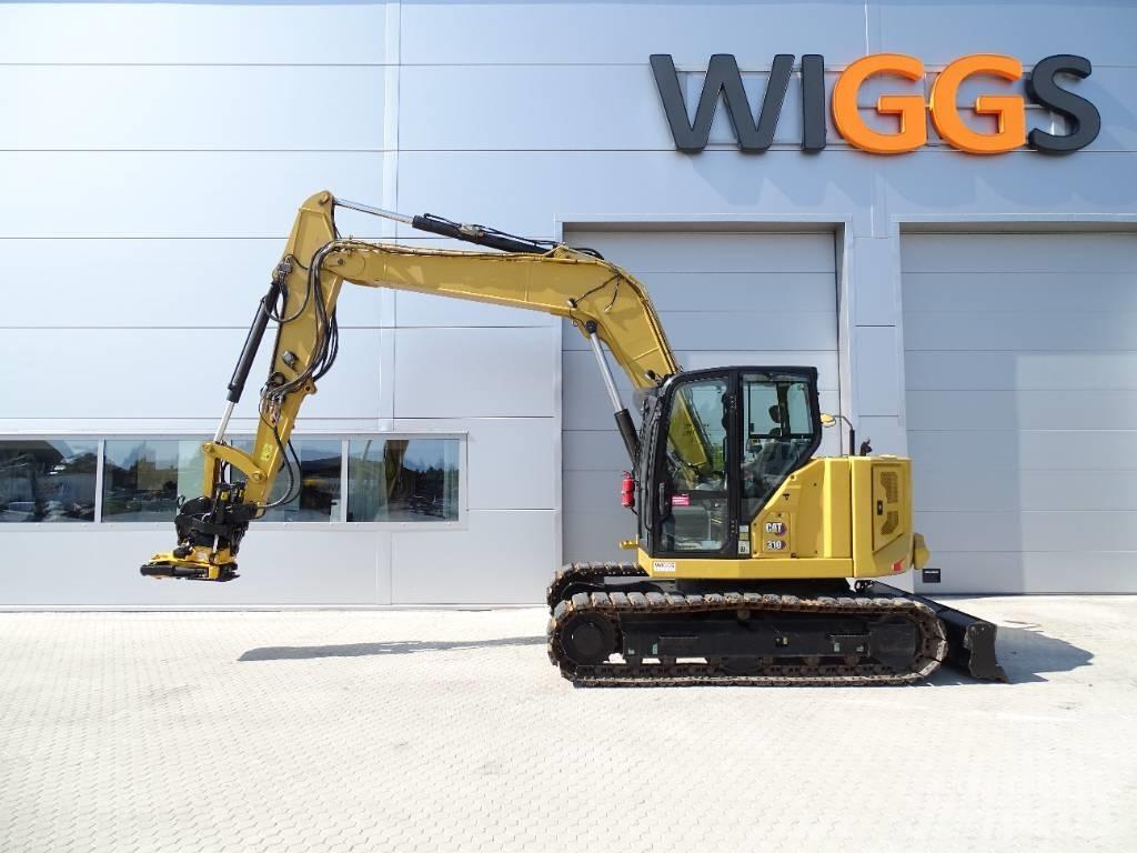 CAT 310 حفارات زحافة
