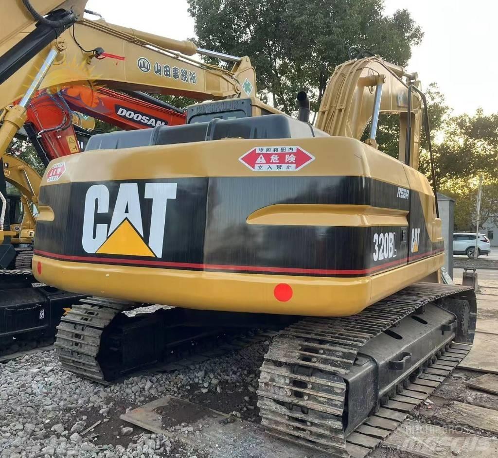 CAT 320 B L حفارات زحافة
