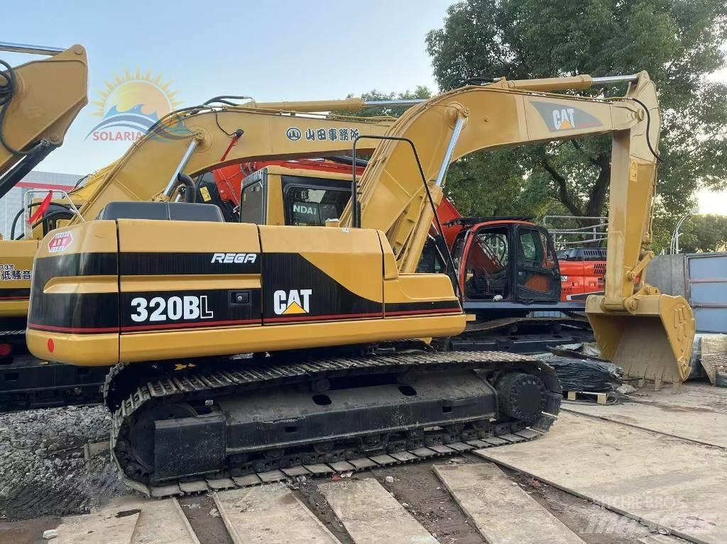 CAT 320 B L حفارات زحافة