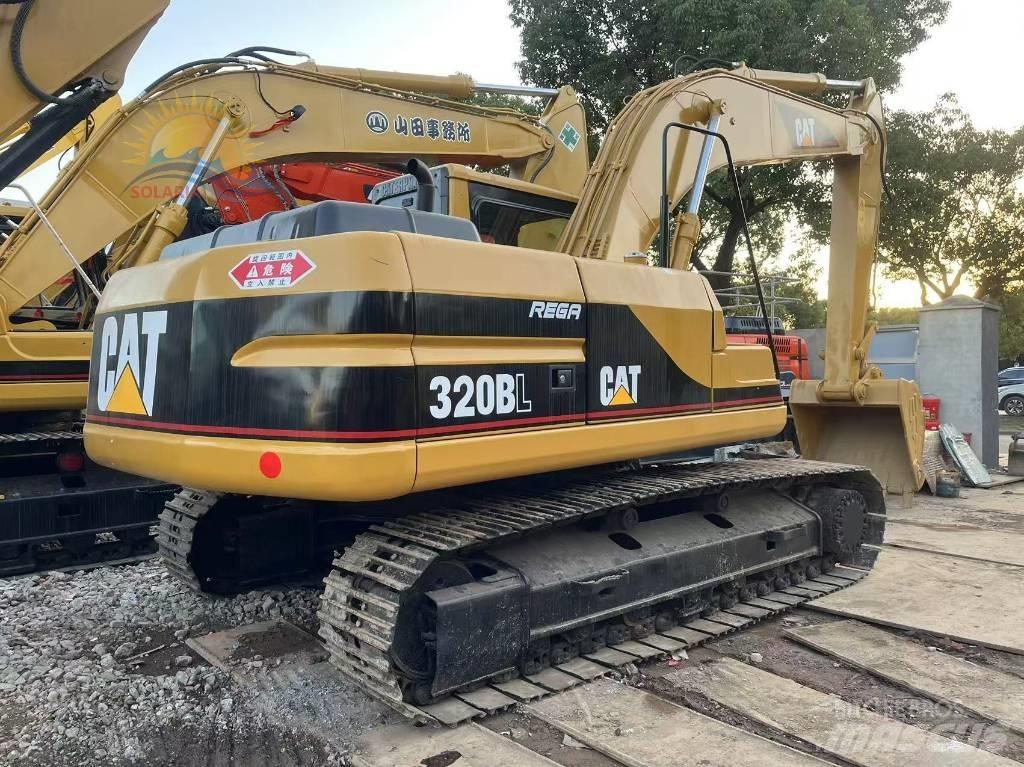 CAT 320 B L حفارات زحافة