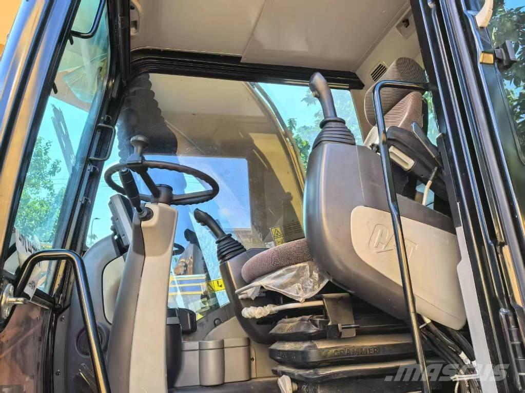 CAT M 315 D حفارات بعجل