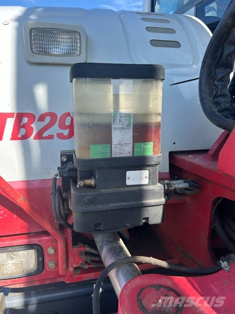 Takeuchi TB 295 W حفارات بعجل