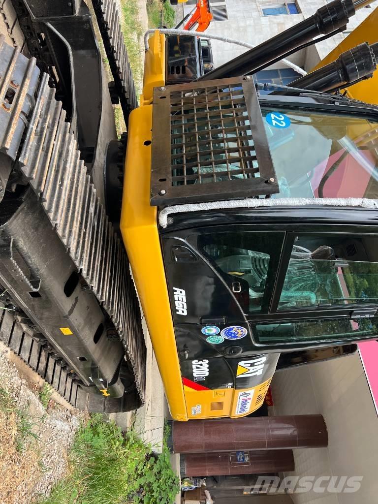 CAT 320D حفارات زحافة