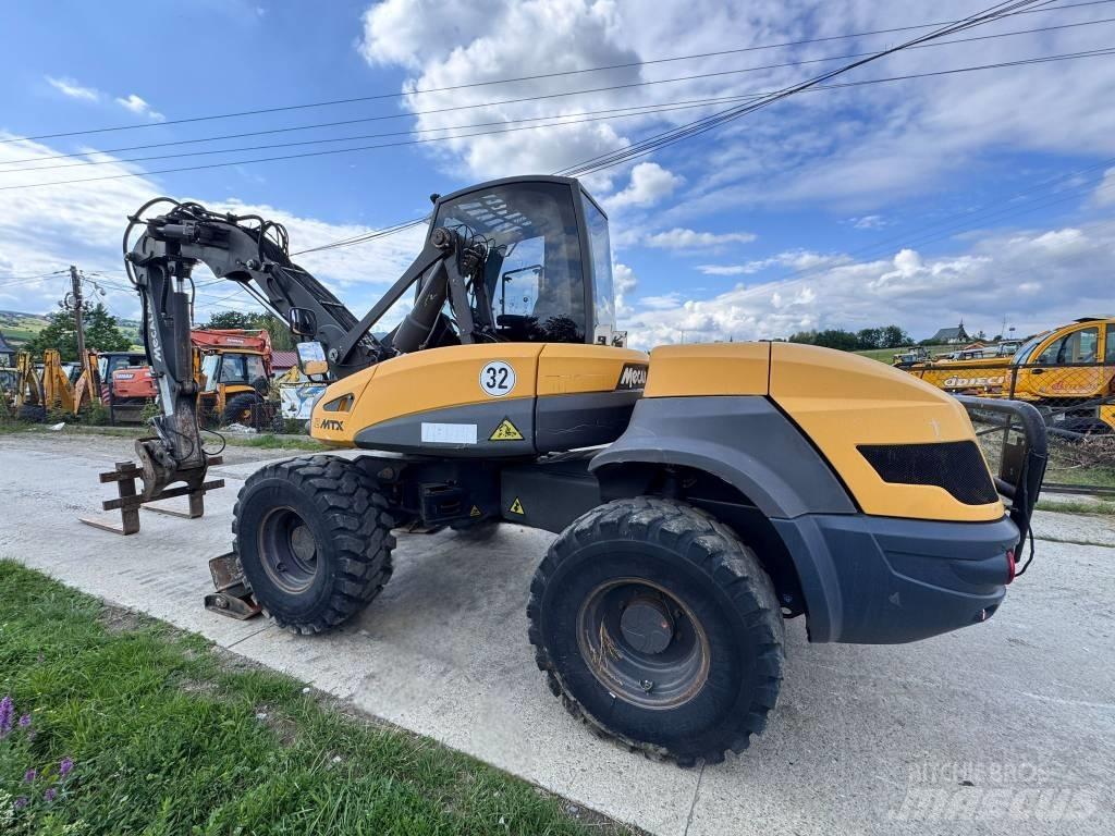 Mecalac 12 MTX لوادر ذات جرافات عكسية