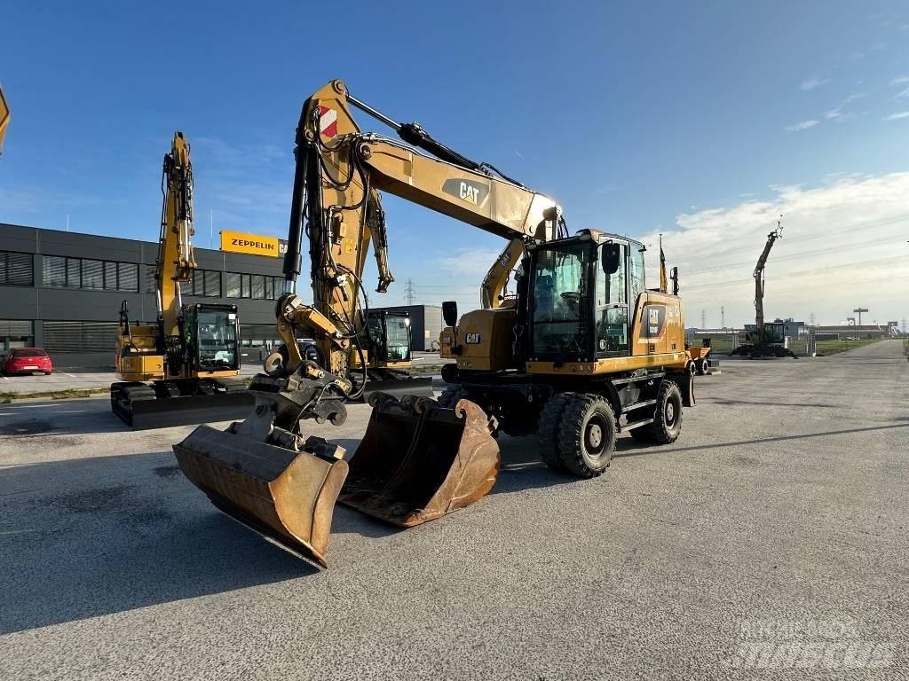 CAT M 318 F حفارات بعجل
