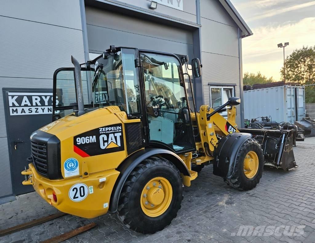 CAT 906 لوادر بعجل