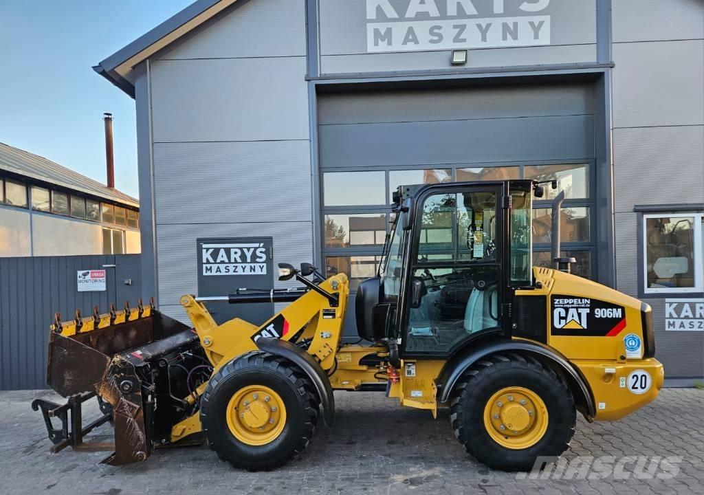 CAT 906 لوادر بعجل