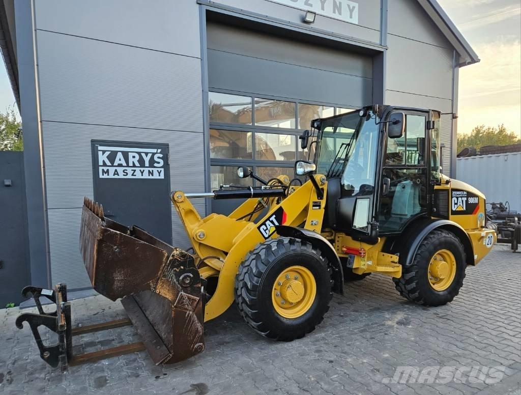 CAT 906 لوادر بعجل