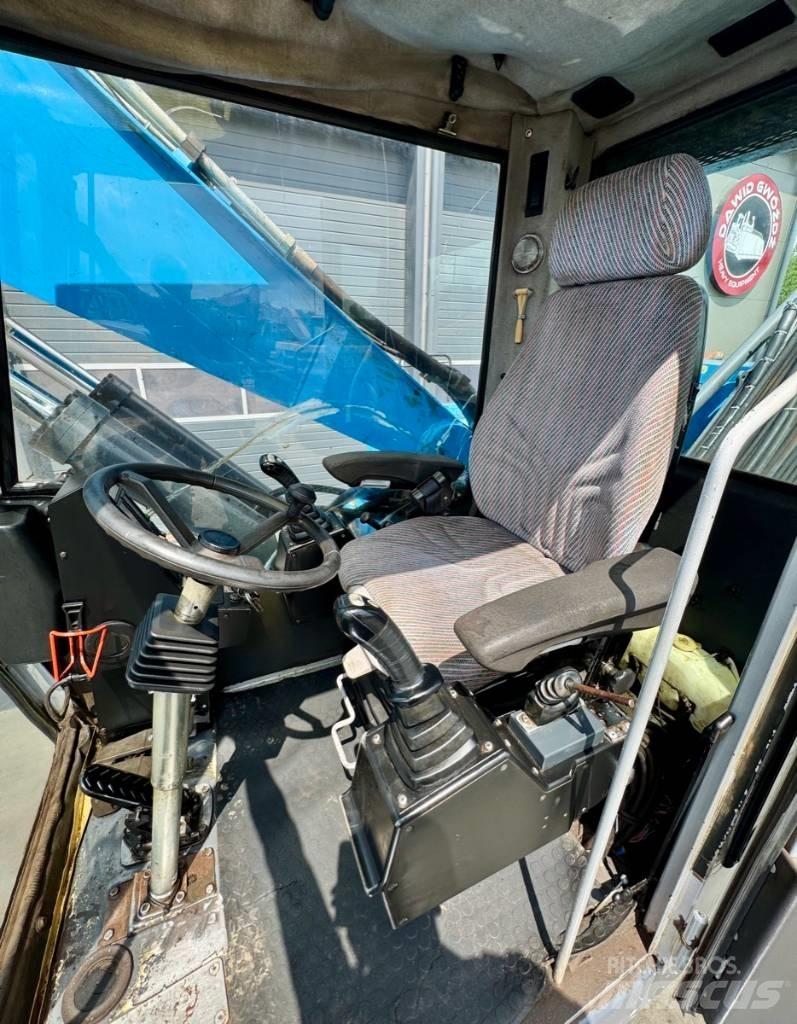 Fuchs MHL 331 مناولات المخلفات / مناولات صناعية