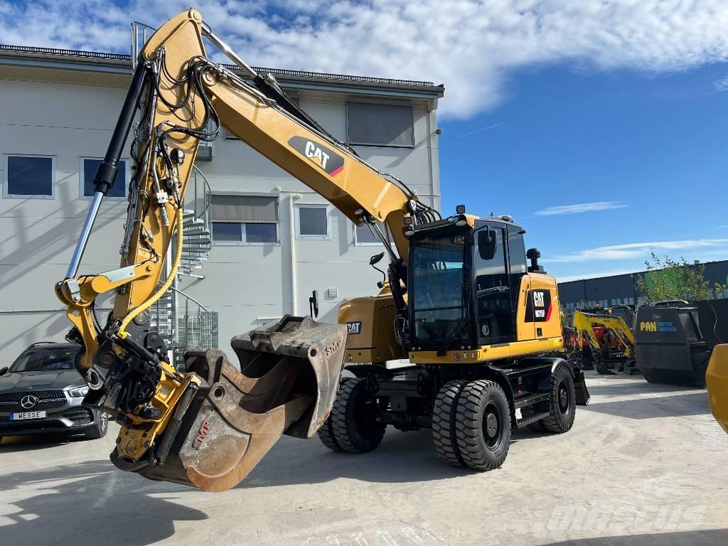 CAT M 315 F حفارات بعجل