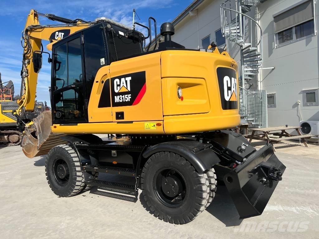 CAT M 315 F حفارات بعجل