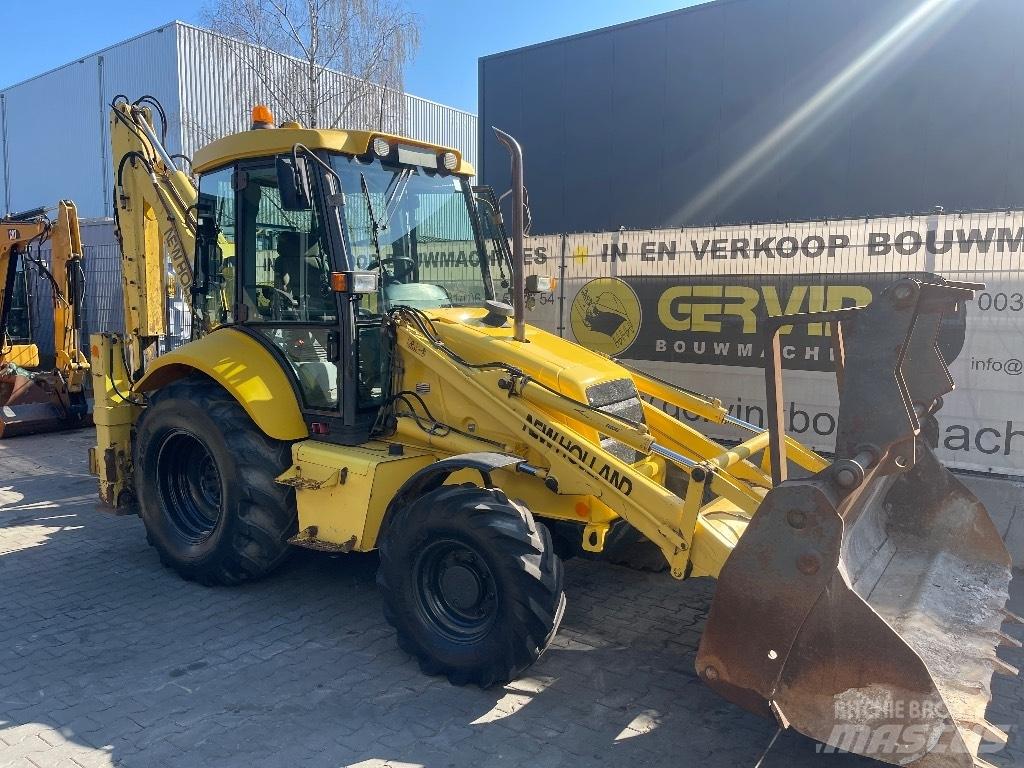 New Holland LB 110 لوادر ذات جرافات عكسية