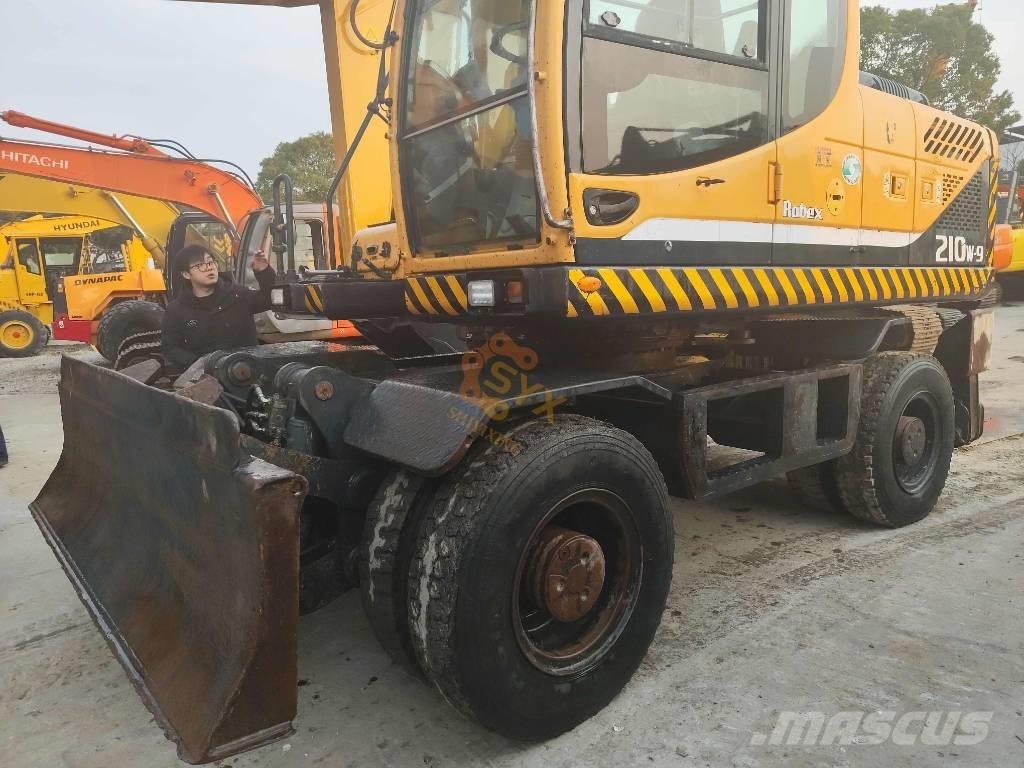 Hyundai 210W-9 حفارات بعجل