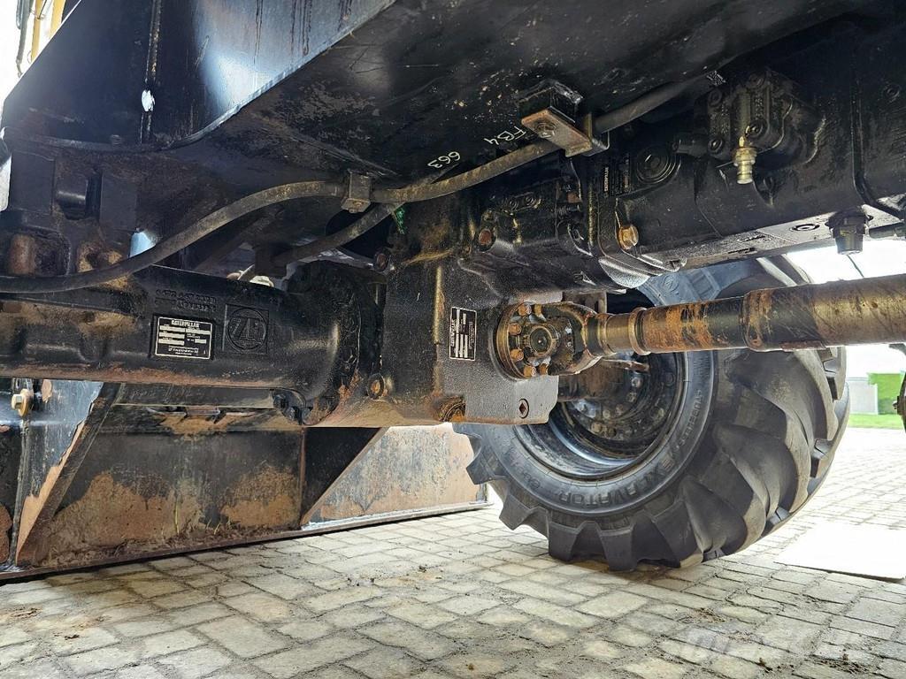 CAT M314F حفارات بعجل