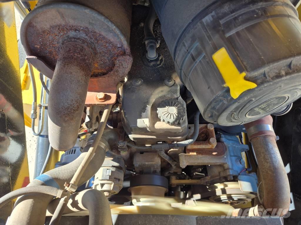 New Holland B 95 B لوادر ذات جرافات عكسية