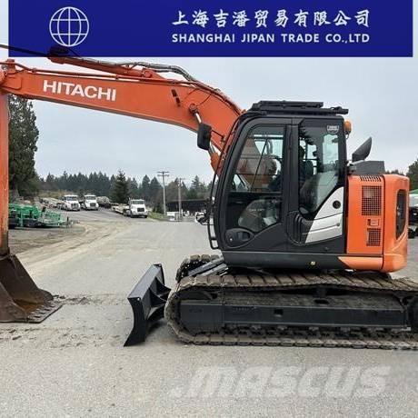 Hitachi ZX 135 حفارات زحافة