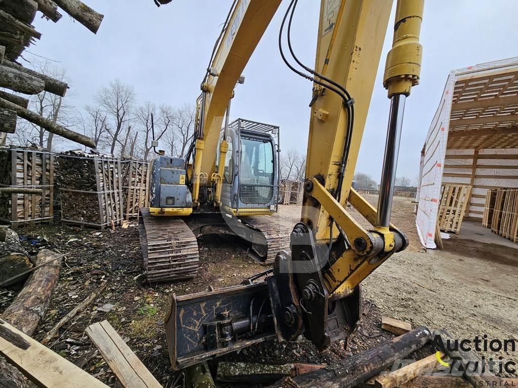 New Holland E 145 حفارات زحافة