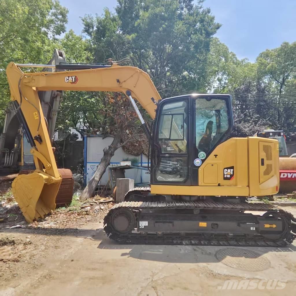 CAT 310 حفارات زحافة