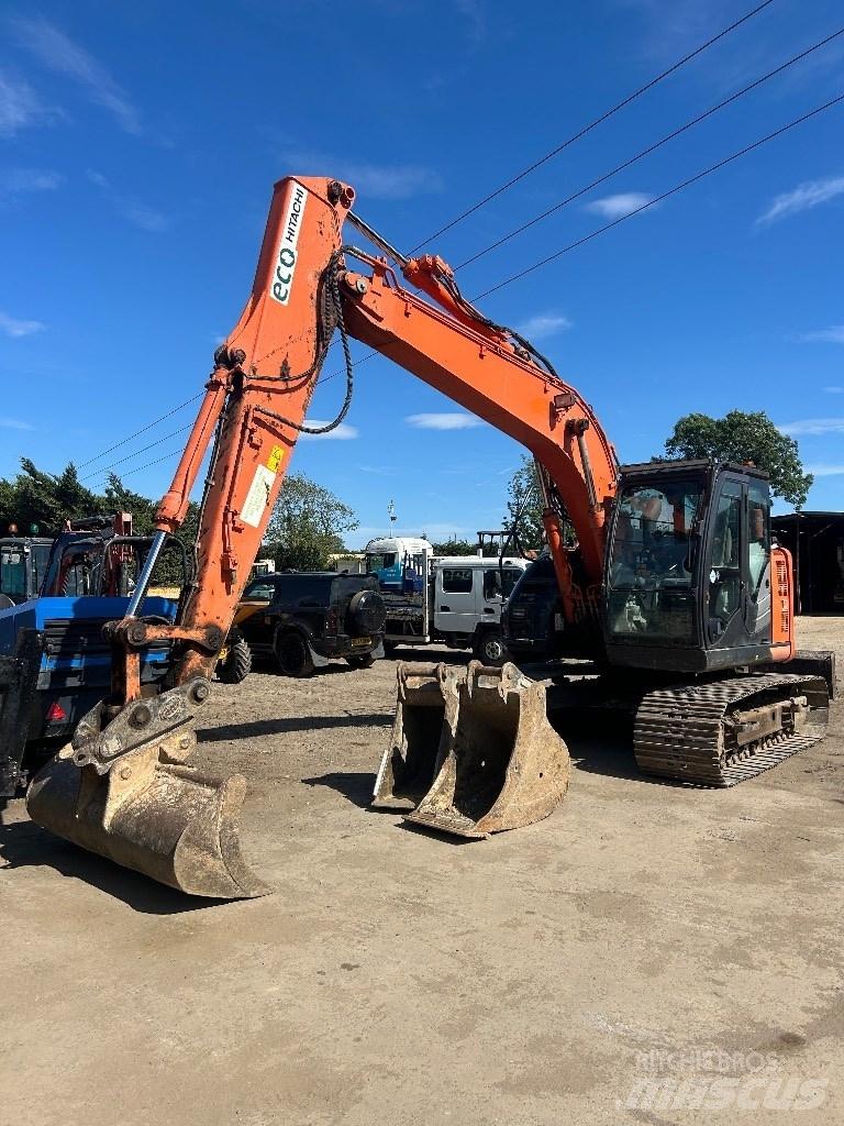 Hitachi ZX 135 US-6 حفارات زحافة