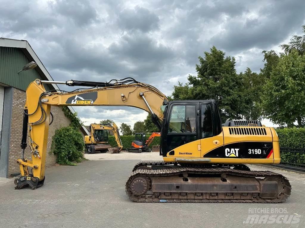 CAT 319D حفارات زحافة