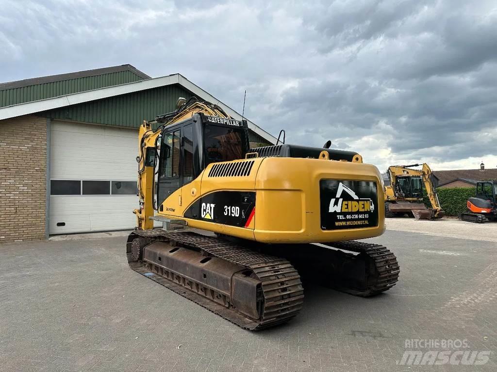 CAT 319D حفارات زحافة