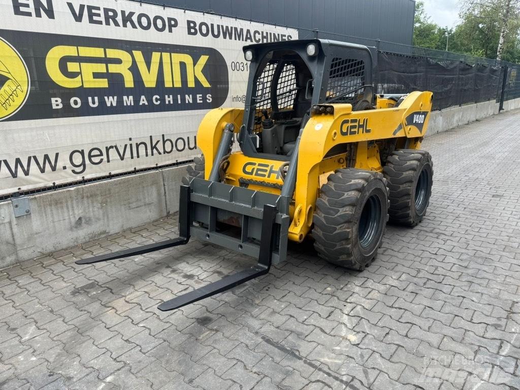 Gehl V 400 لوادر انزلاقية التوجيه