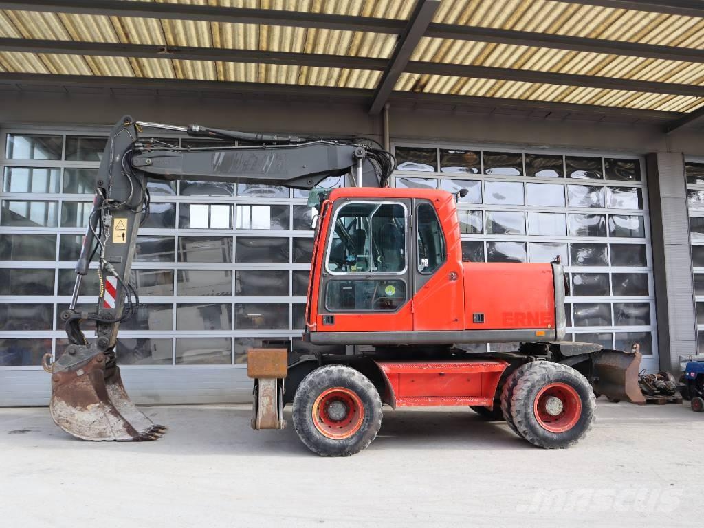 Volvo EW 140 B حفارات بعجل