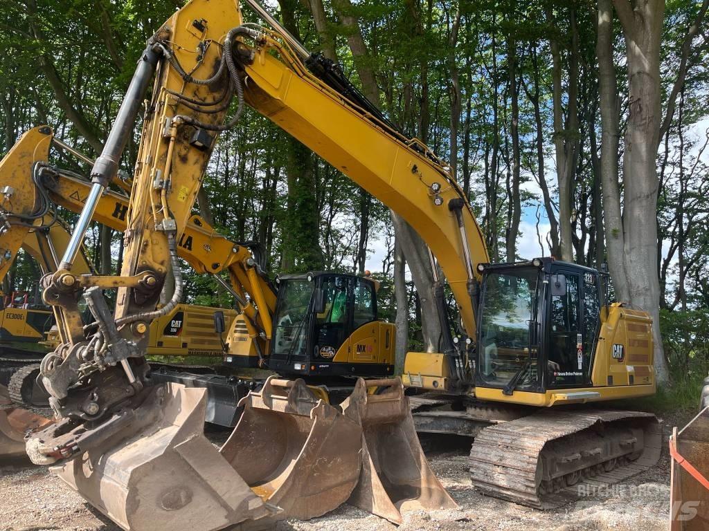 CAT 323 حفارات زحافة
