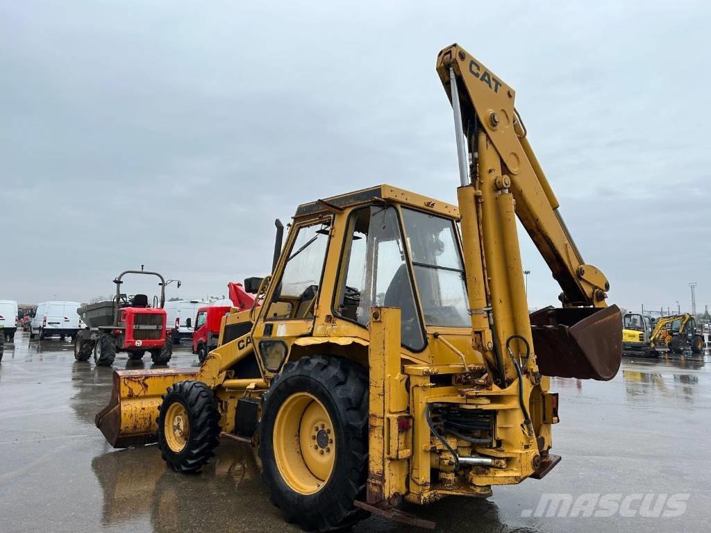 Caterpillar 428 428 لوادر ذات جرافات عكسية