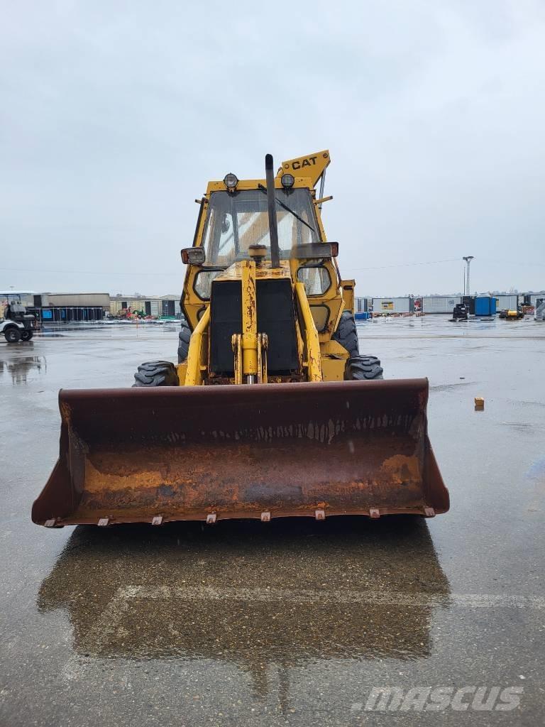 Caterpillar 428 428 لوادر ذات جرافات عكسية